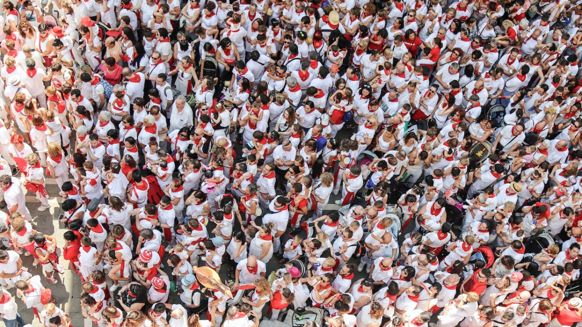 Photo by San Fermin Pamplona: https://www.pexels.com/photo/bird-s-eye-view-of-group-of-people-1299086/